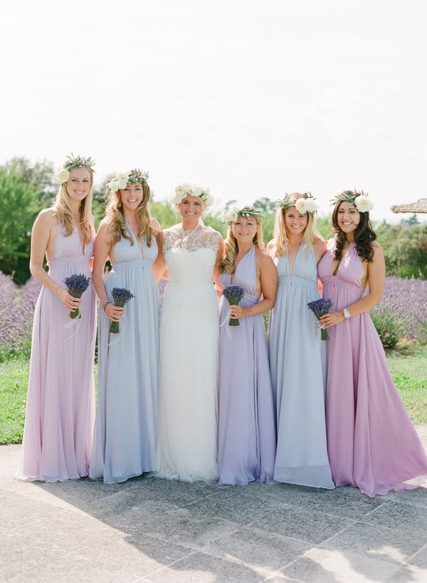 Bride with bridesmaids in pastel bridesmaid dresses
