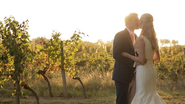 Bride and groom kissing