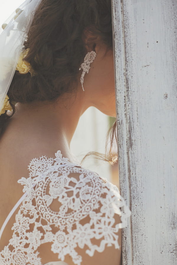 Lace detail on shoulder of bride's dress