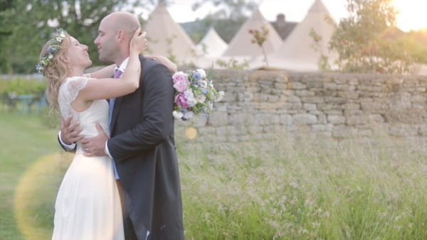 Bride and groom at tipi wedding