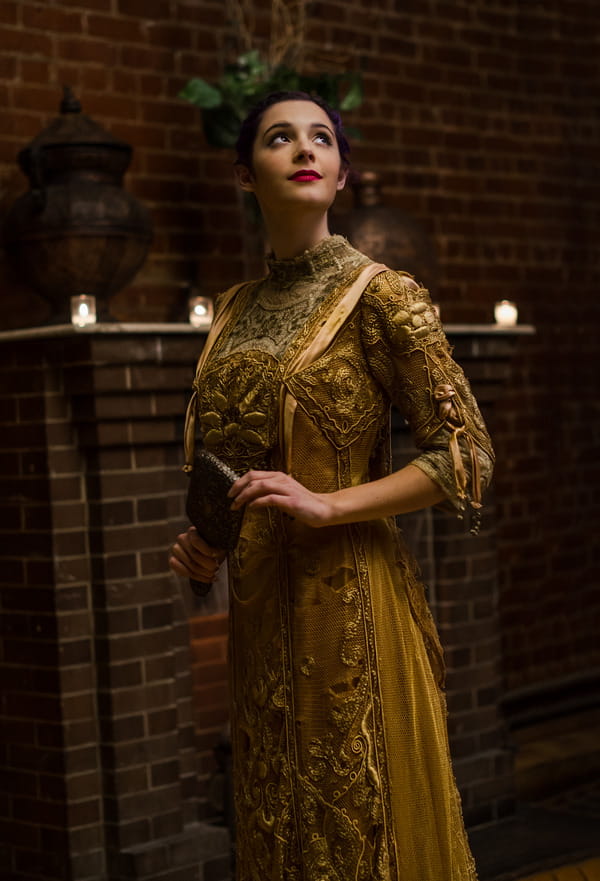 Bride in gold vintage wedding dress