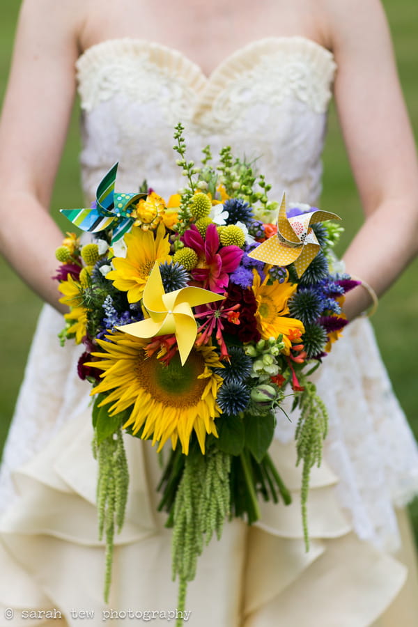 Bride and bold wedding bouquet with pinwheels