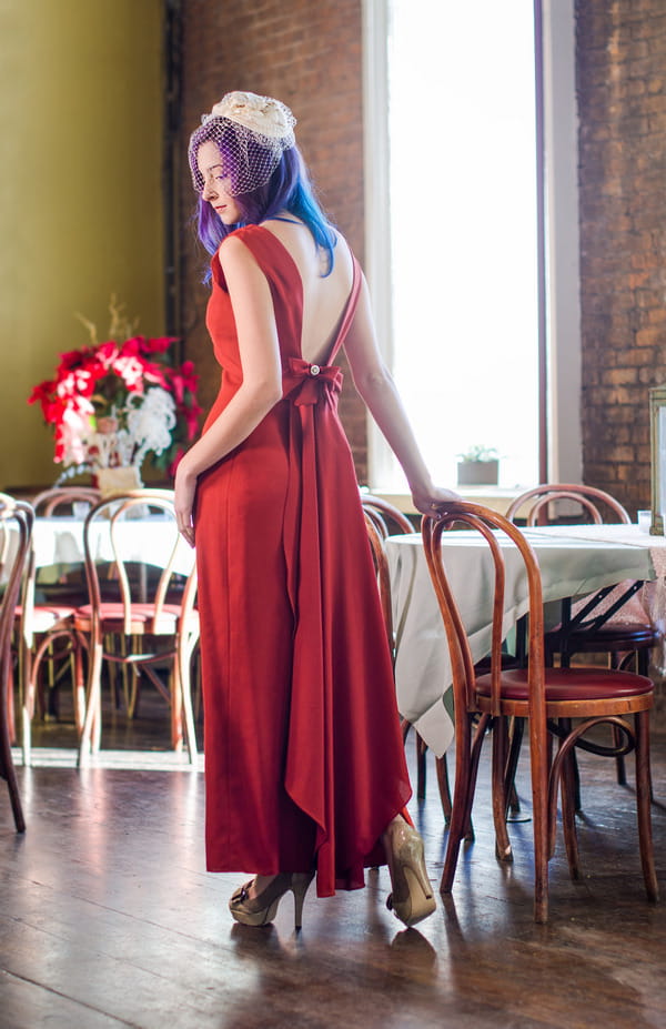 Back of bride's red vintage wedding dress