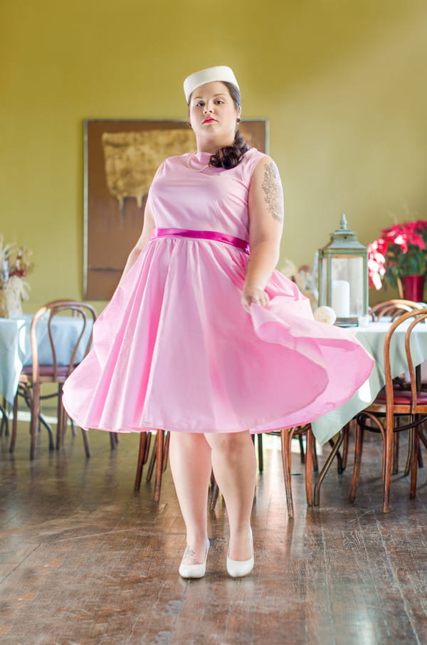 Bride wearing retro pink wedding dress