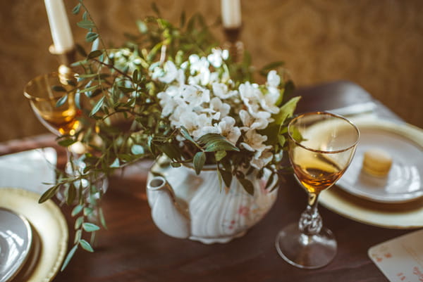 Rustic wedding flowers in vintage teapot