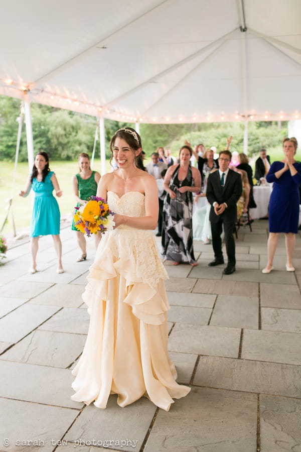 Bride tossing bouquet