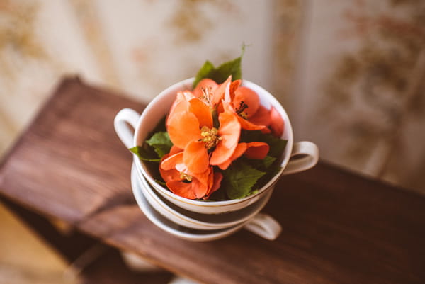 Flowers in vintage cups