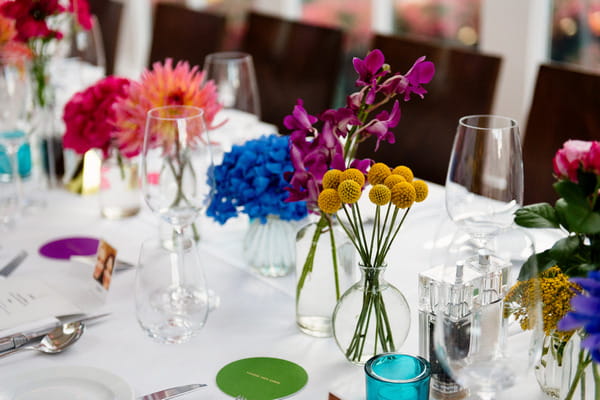 Colourful wedding table flowers