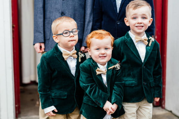 Pageboys in green velvet jackets