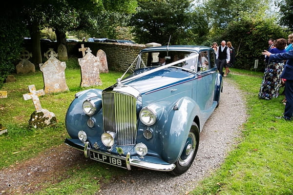 Vintage blue Rolls Royce wedding car