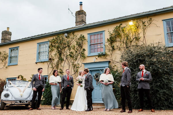 Bridal party outside South Farm, Royston