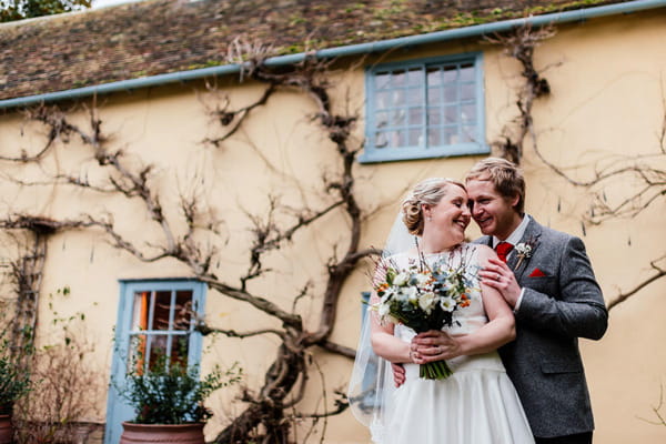 Bride and groom outside South Farm, Royston