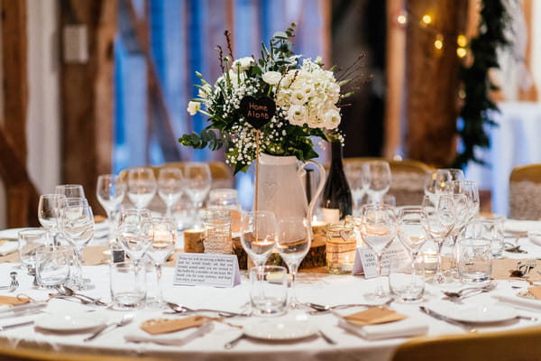 Wedding table with jug of flowers