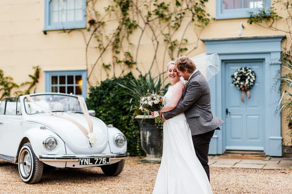 Bride and groom outside South Farm in Royston