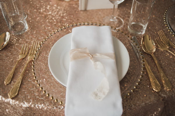 Metallic gold wedding place setting