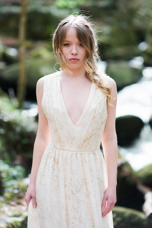 Bride wearing lace detailed wedding dress