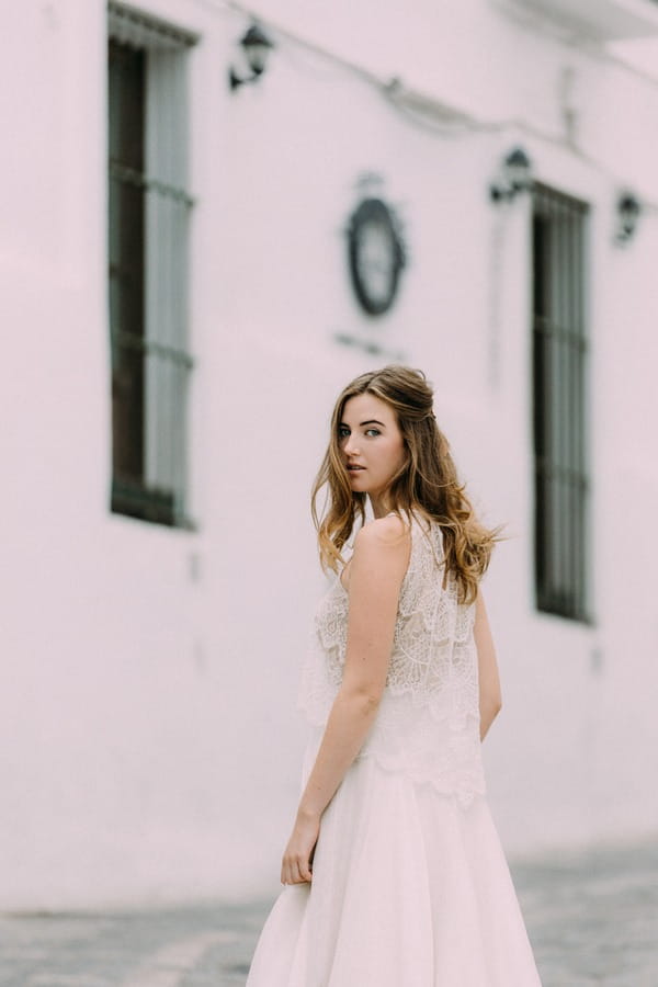 Back of bride's lace detailed boho wedding dress