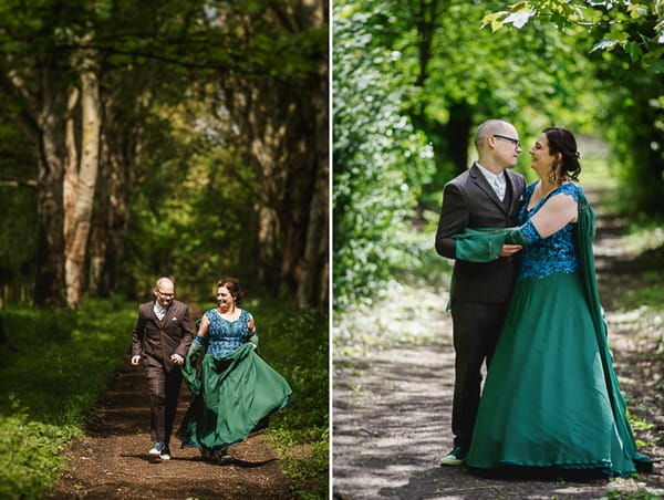 Bride and groom running through woodland