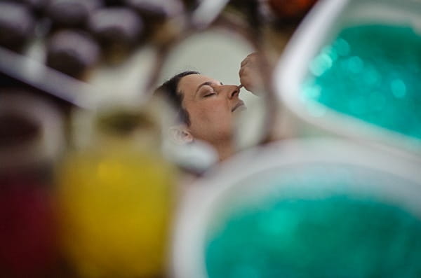 Bride's reflection in make-up mirror