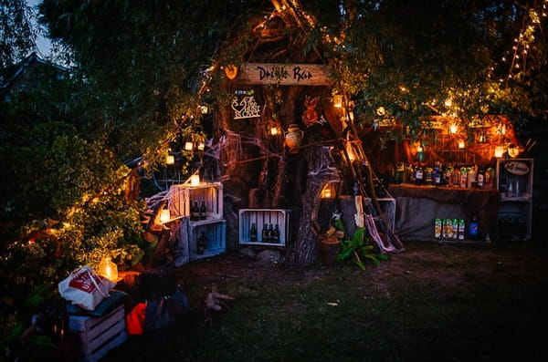 Wedding drinks bar around a tree