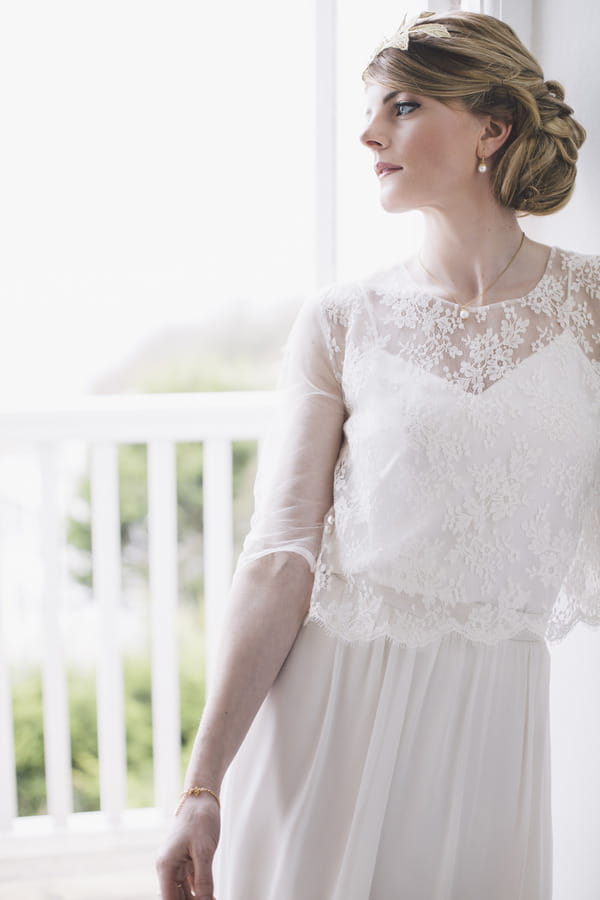 Bride wearing lace detailed wedding dress