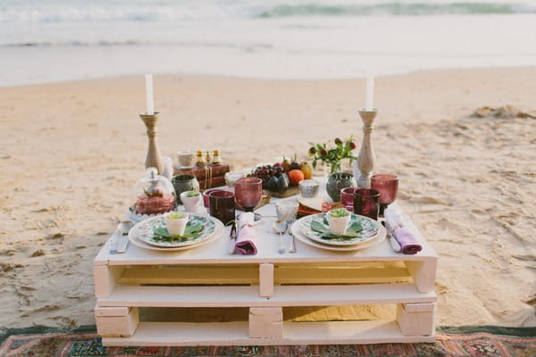 Wedding table made from pallets on beach