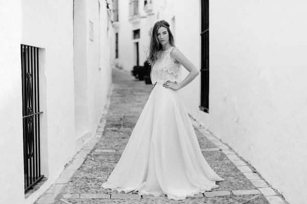 Boho bride with hands on hips