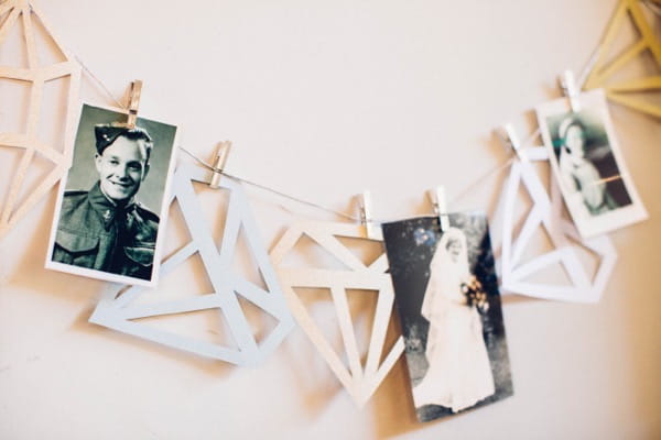 Old photographs hung on string
