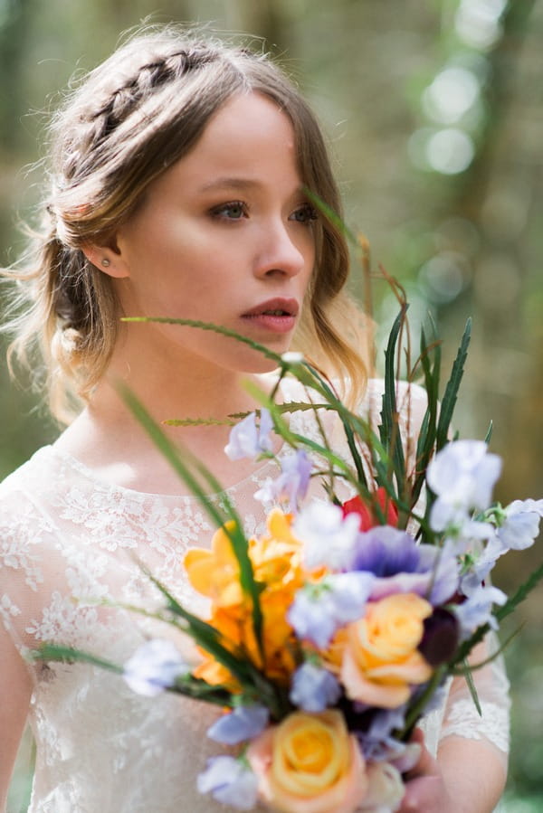 Bride with plait updo hairstyle