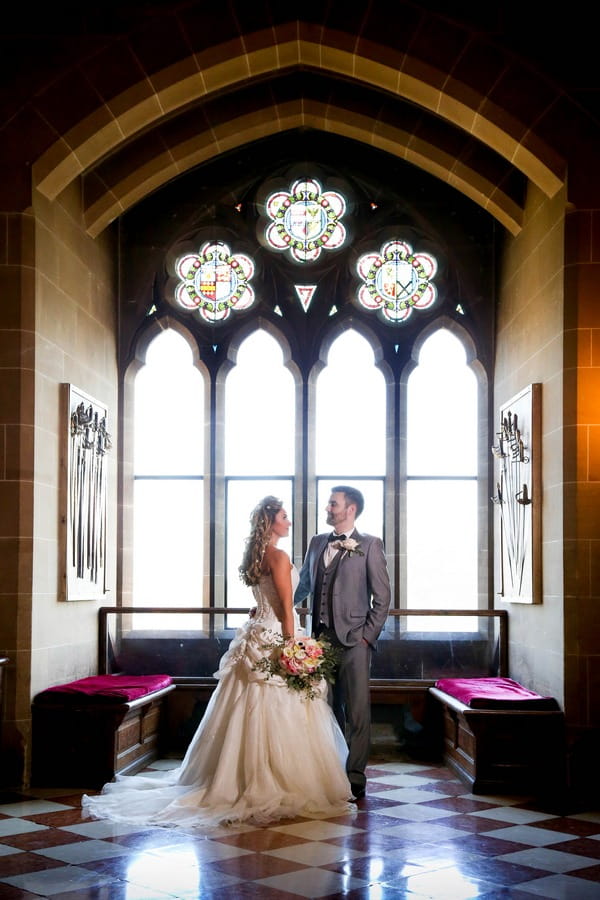Bride and groom in the Great Hall at Warwick Castle