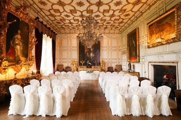 Wedding ceremony seating in State Dining Room at Warwick Castle