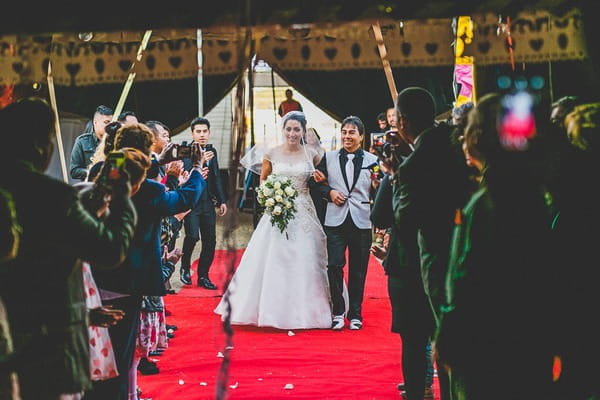 Uncle walking bride down aisle