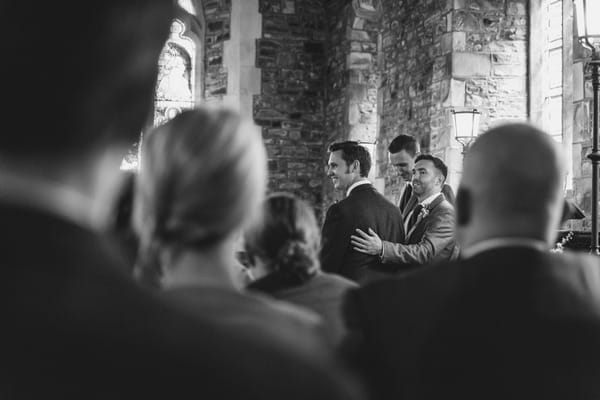 Groom waiting in church for bride