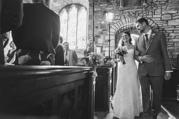 Bride entering church for wedding ceremony