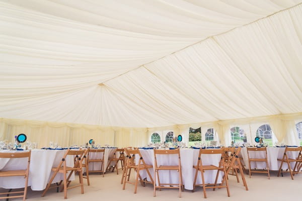 Wedding tables in marquee at Buckland House