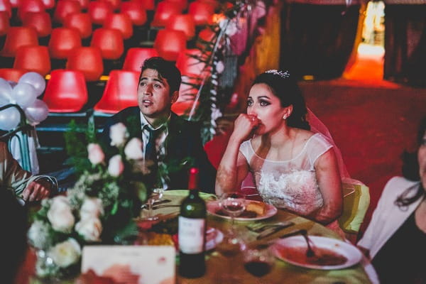 Bride and groom emotional at speech