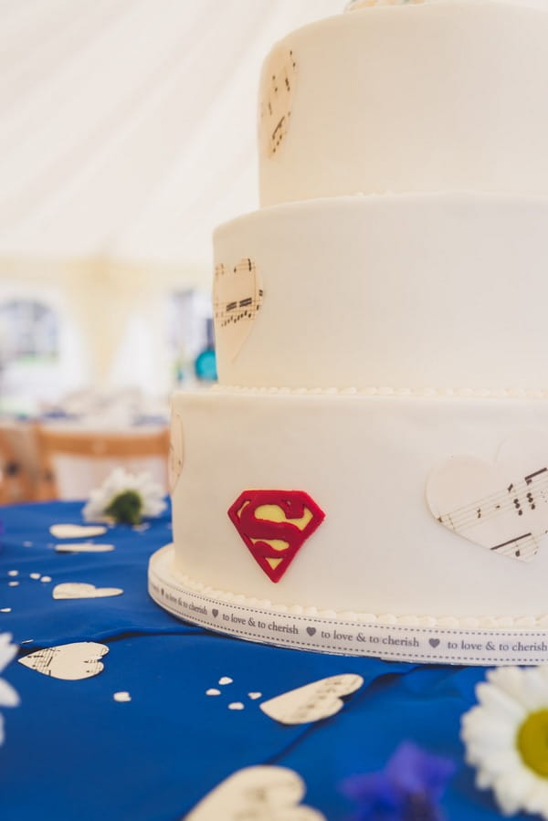 Superman S on side of wedding cake