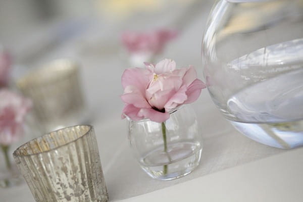 Small pink flower on wedding table