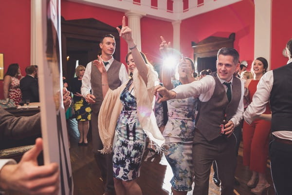 Guests dancing at wedding at Buckland House