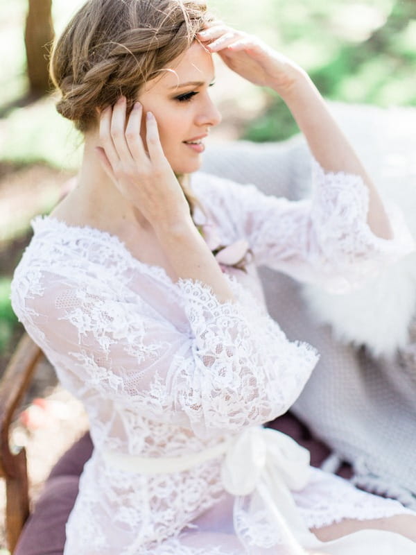 Lace detail on bohemian bride's wedding robe