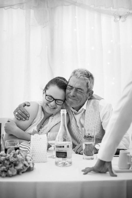 Grandfather hugging bride after wedding speech - Picture by Snappily Ever After