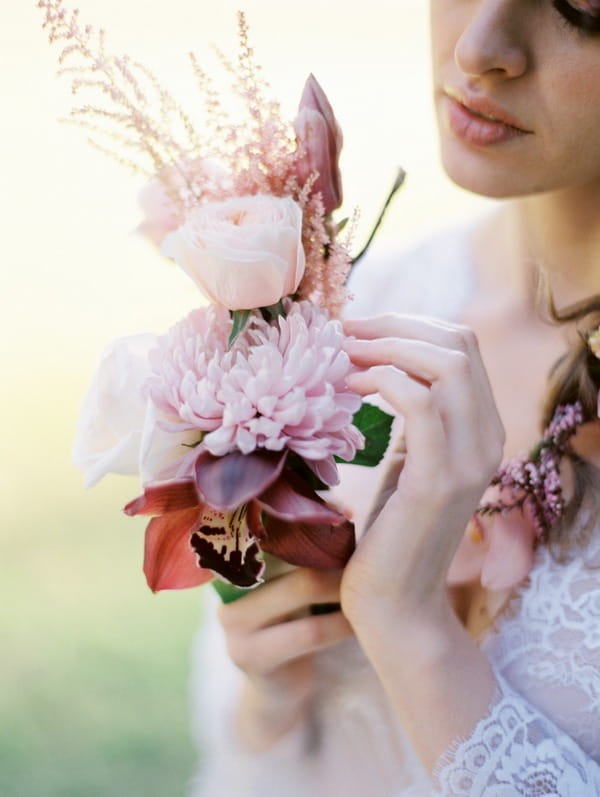 Bride holding small bouquet