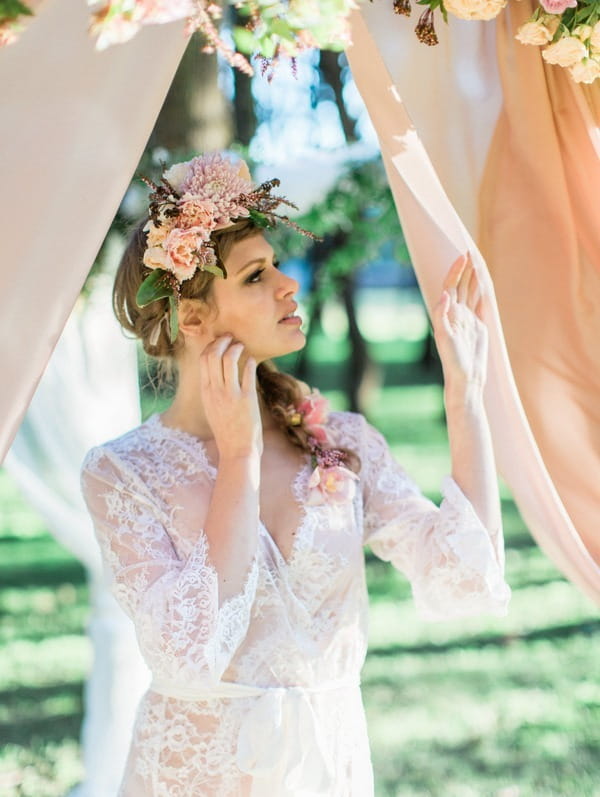 Bohemian bride looking up