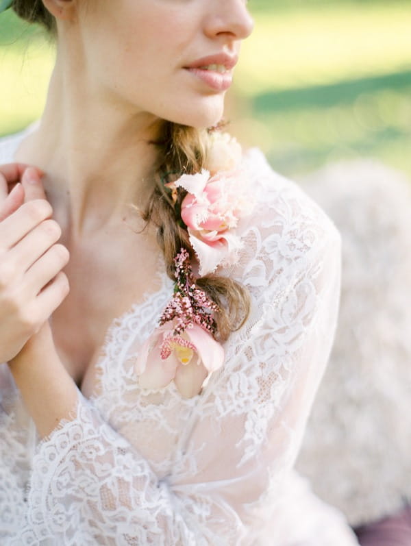 Bohemian bride's ponytail with flowers