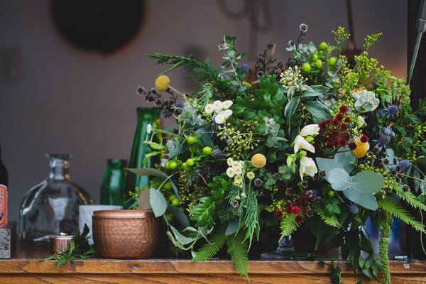 Bar with foliage arrangement