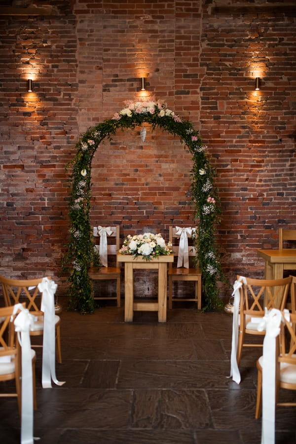Flower arch altar at Packington Moor wedding