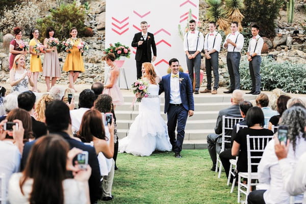 Katie Leclerc and Brian Habecost leaving wedding ceremony