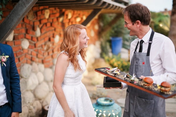 Katie Leclerc laughing at wedding