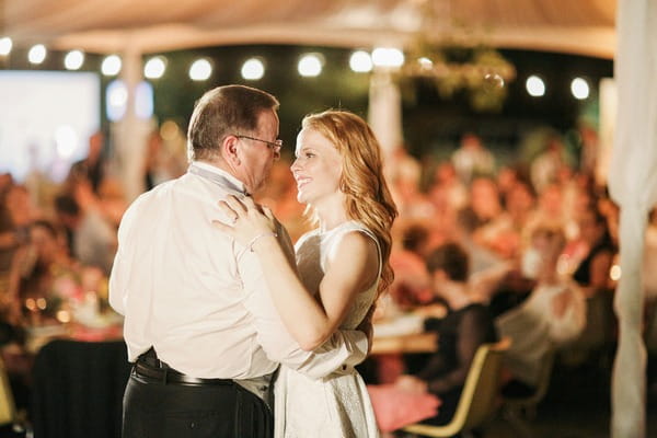 Katie Leclerc dancing with father at her wedding