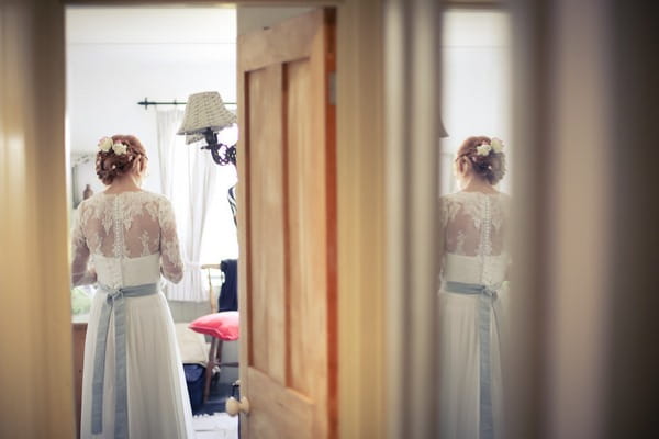 Back of bride's lace wedding dress